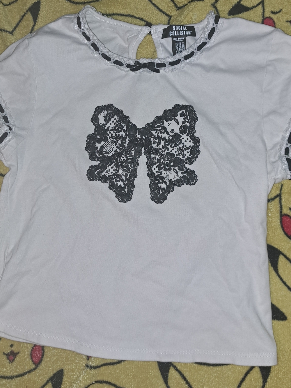 Social Collision White Tee with Black Lace Bow Print